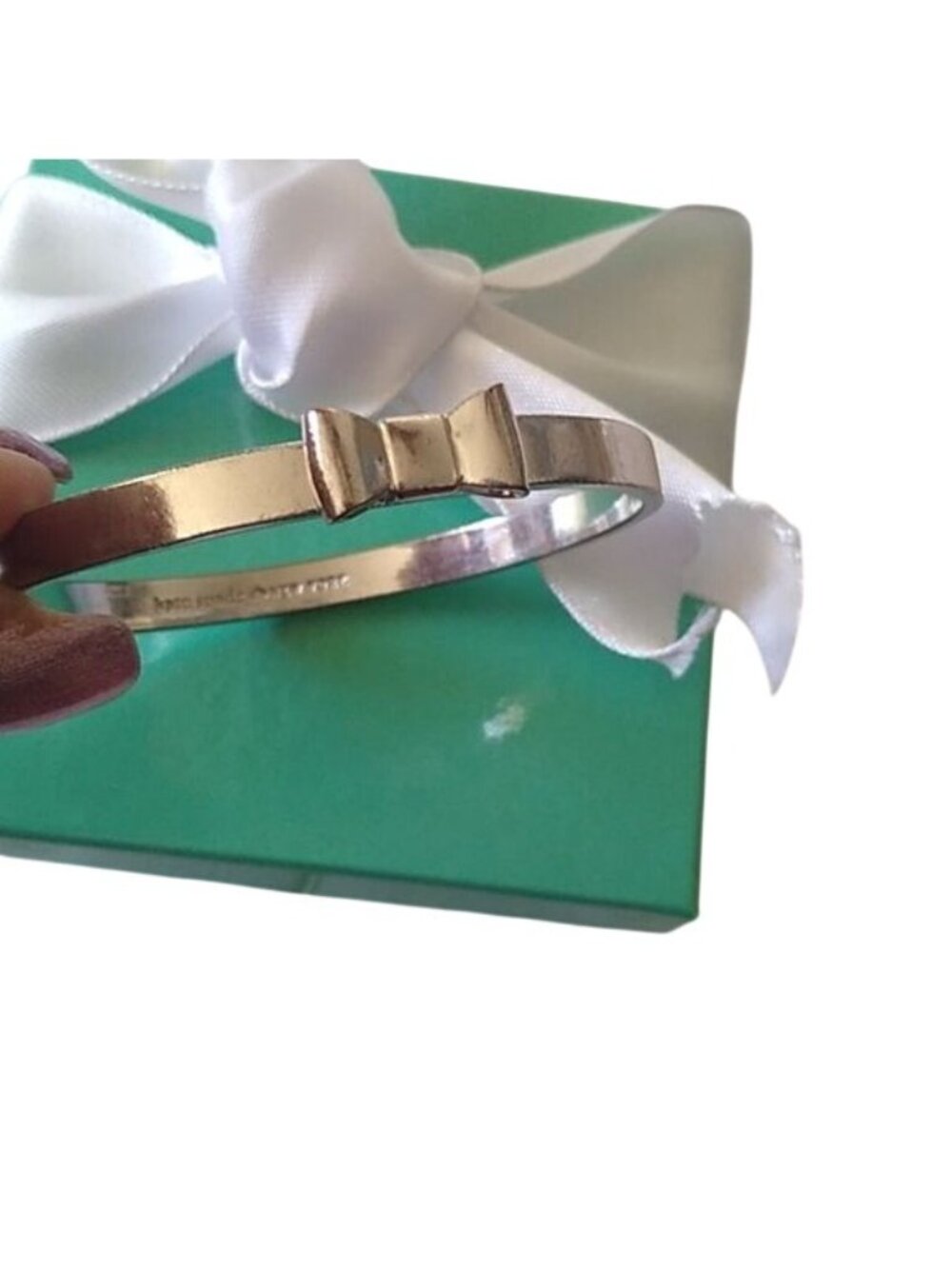 Kate Spade New York Take A Bow Bangle Bracelet, Silver, 2 3/8" opening - Picture 2 of 7